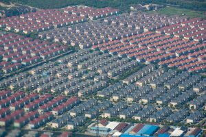 Multiple rows and blocks of new-build housing seen from above