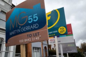 'To let' signs outside a row of terraced houses