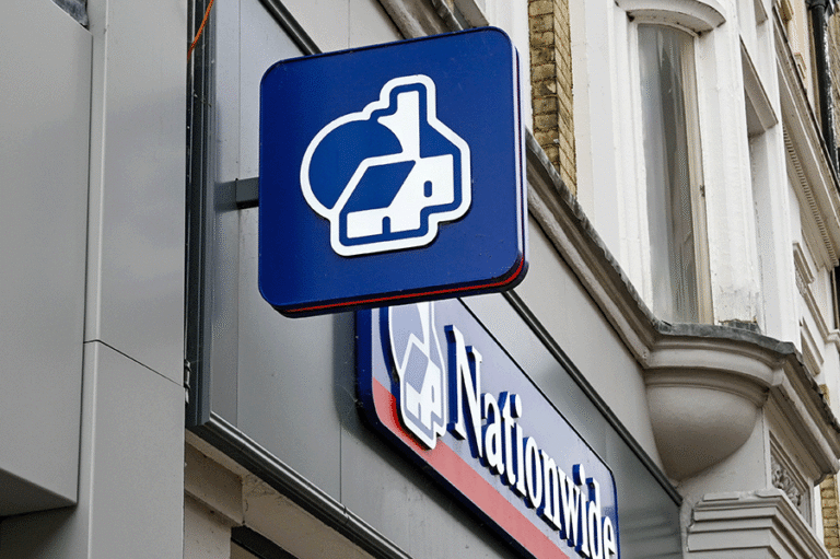 The exterior of a Nationwide Building Society with a close-up on the sign