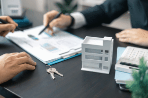 An estate agent discusses information with a client