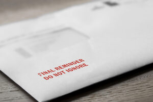Final reminder do not ignore letter stamped in red on an evelope.