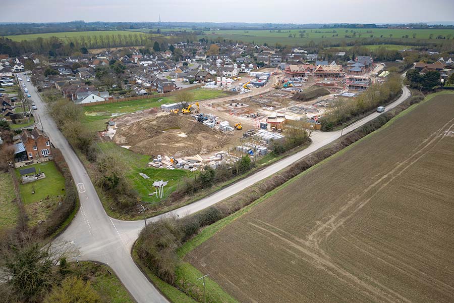 An aerial view of a large partically completed housing development