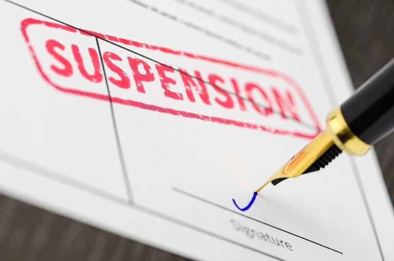 A form with the word 'suspension' stamped on it in red