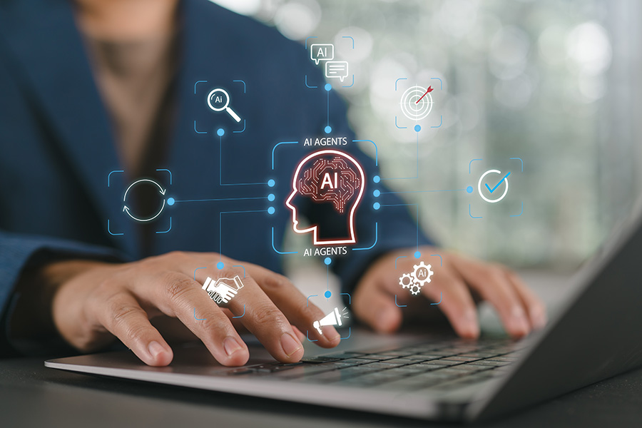 Graphics of an AI 'brain' surrounded by prompts are overlaid across a picture of hands typing on a laptop