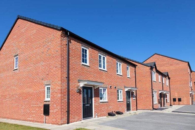 A row of new, unoccupied, affordable homes