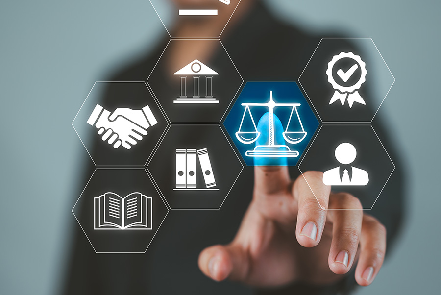 A blurred image of a person in the backgroun reaches out to touch an overlaid graphic including images of a handshake, files, a court, book and scales of justice