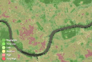 A heatmap of London showing the Thames and areas in green and red, indicating risk levels from low to high
