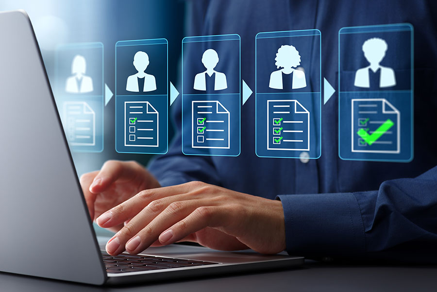 Graphics of digital client files overlaid on a photo of hands typing on a laptop