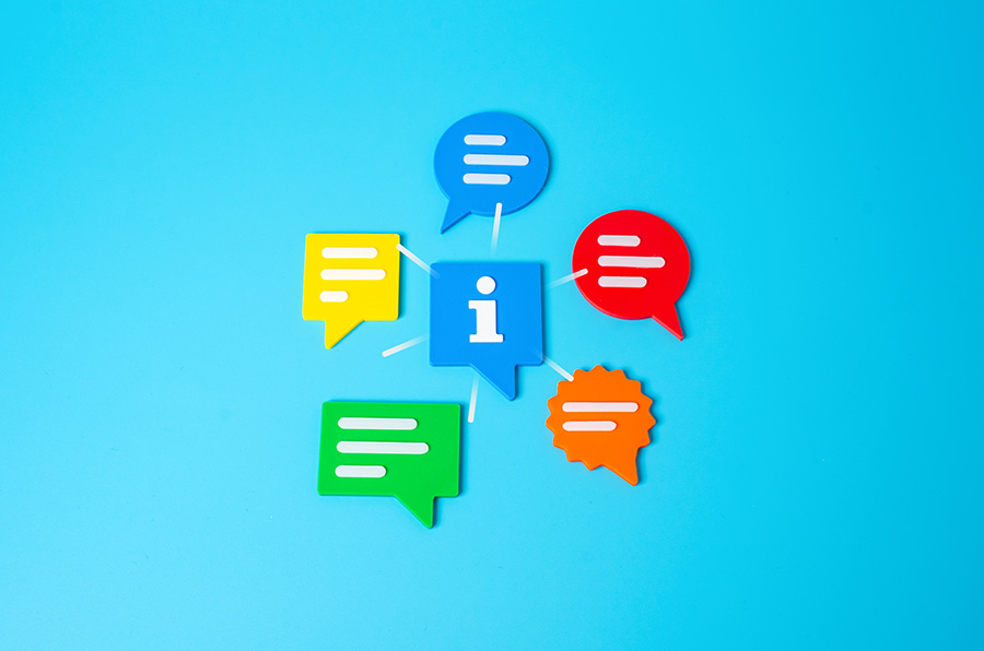 Coloured speech bubbles on a blue background
