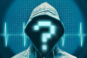 A hooded figure with a neon question mark covering his face