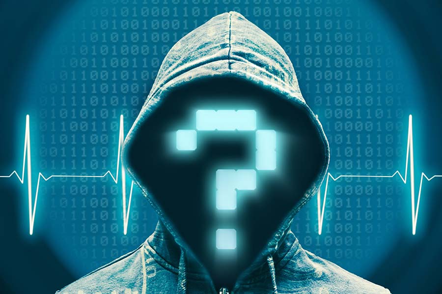 A hooded figure with a neon question mark covering his face