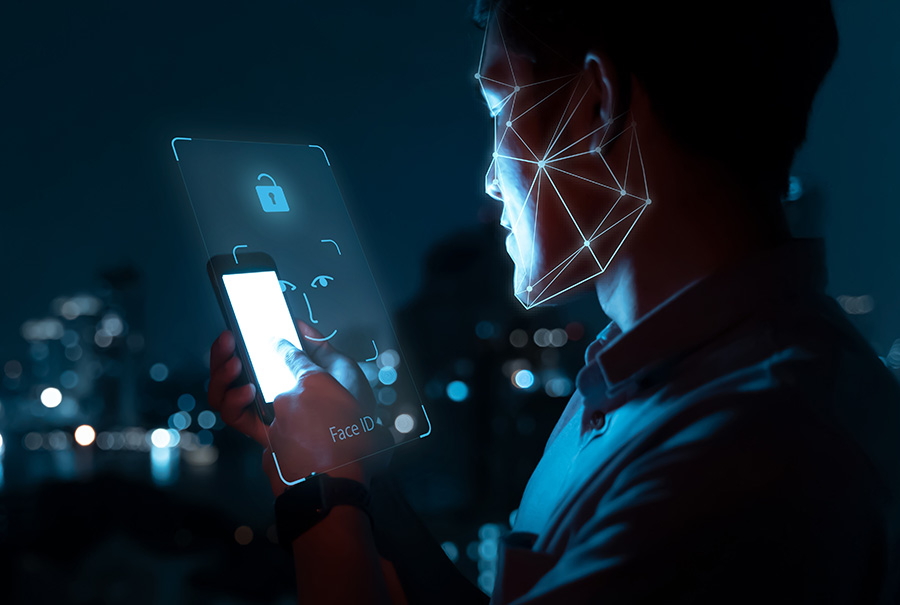 A man scans his face with his phone
