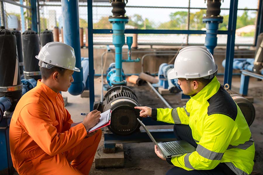 Engineers at a water pumping station