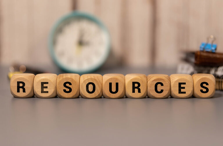 The word resources spelled out on wooden cubes