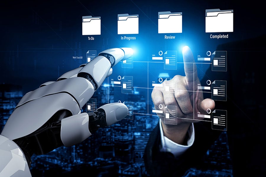 A graphic depicting several digital files linked together, with a robotic hand reaching to them on one side and a human hand on the other