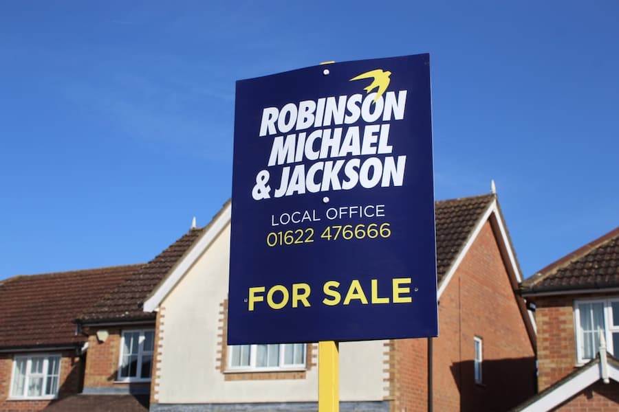For sale sign outside a property for sale