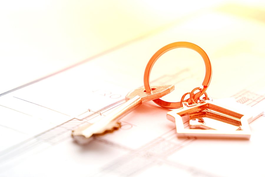 A set of keys on a property deed