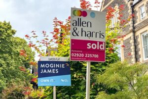 Estate agency signs outside houses on Cathedral Road, Cardiff