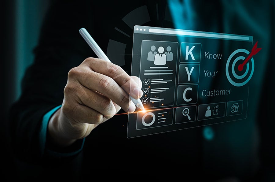 A graphic of a digital screen with the letters KYC and a list with tick marks next to each line