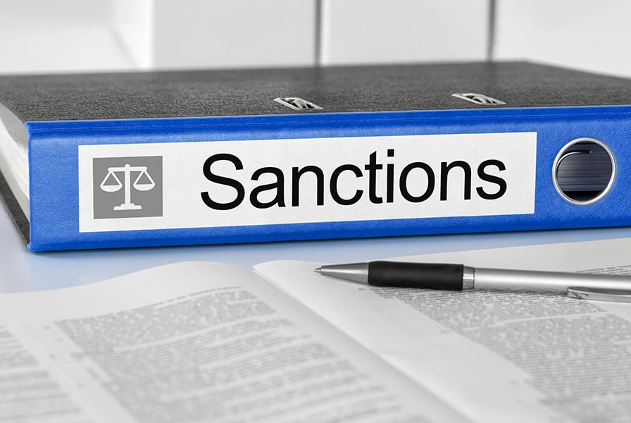 A file marked with the word sanction