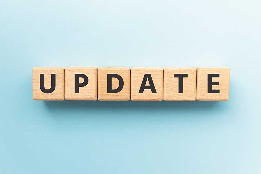 light blue background with wooden blocks saying 'update'