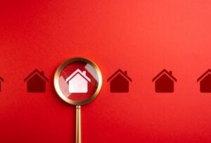 House and magnifying glass. Find a suitable home. Take a mortgage. Investments in immovable assets